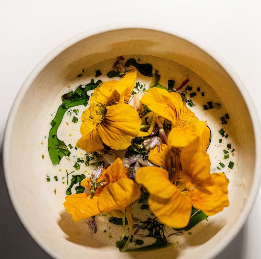 Flower garnished dish at Darkroom